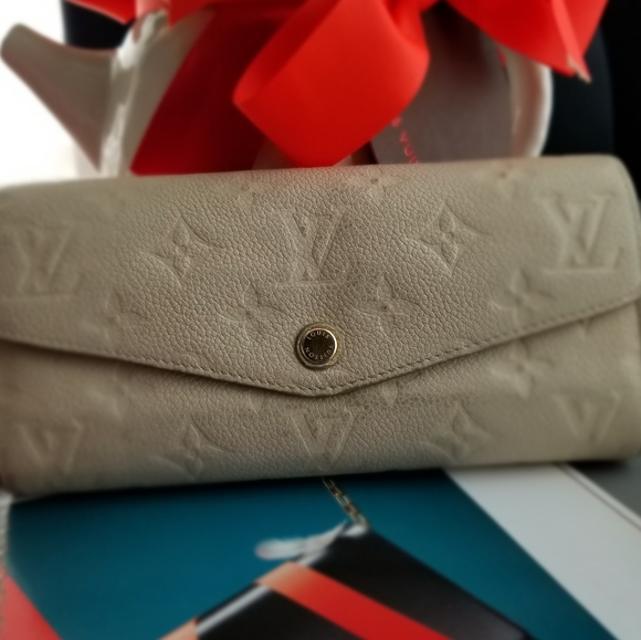 LOUIS VUITTON Portefeuille Empreinte Neige Mono - Picture 10 of 16